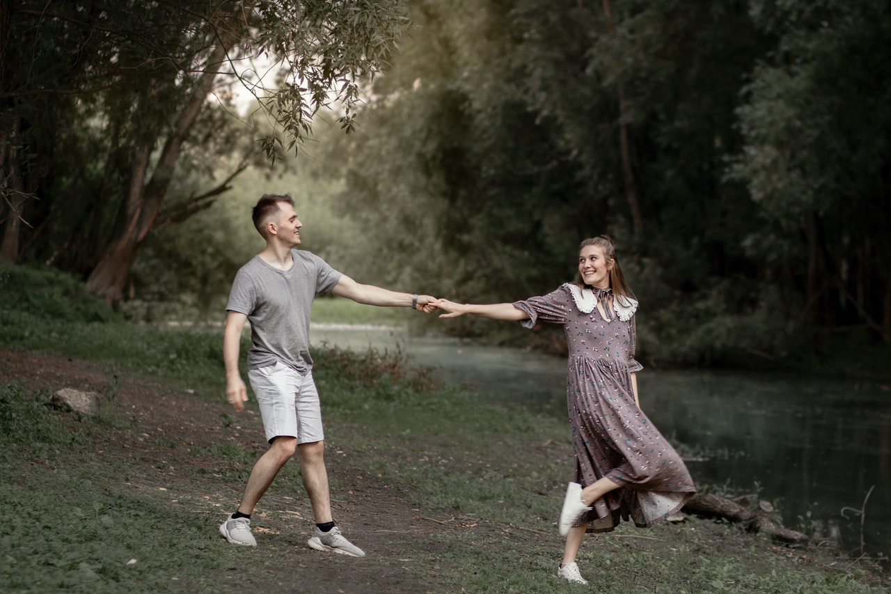 Happy Couple Holding Hands 212 Angel Number