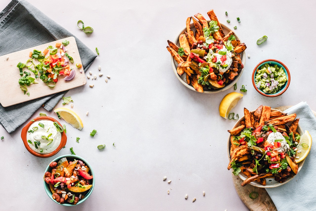 Assorted Salads And Fries on Bowls