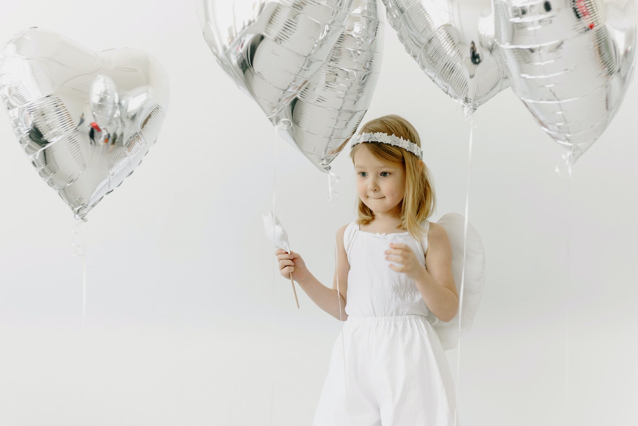 Girl in White Dress Holding White Umbrella