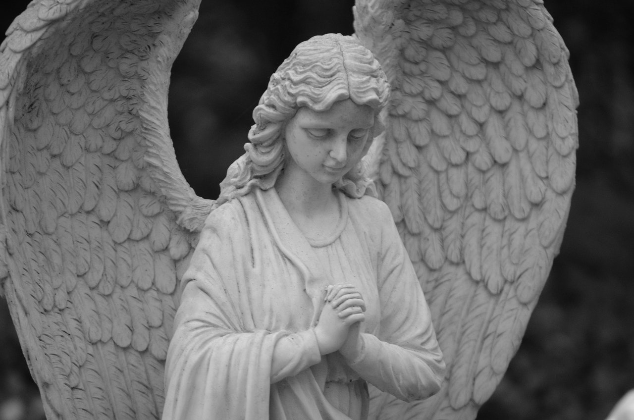 Grayscale of an Angel Statue