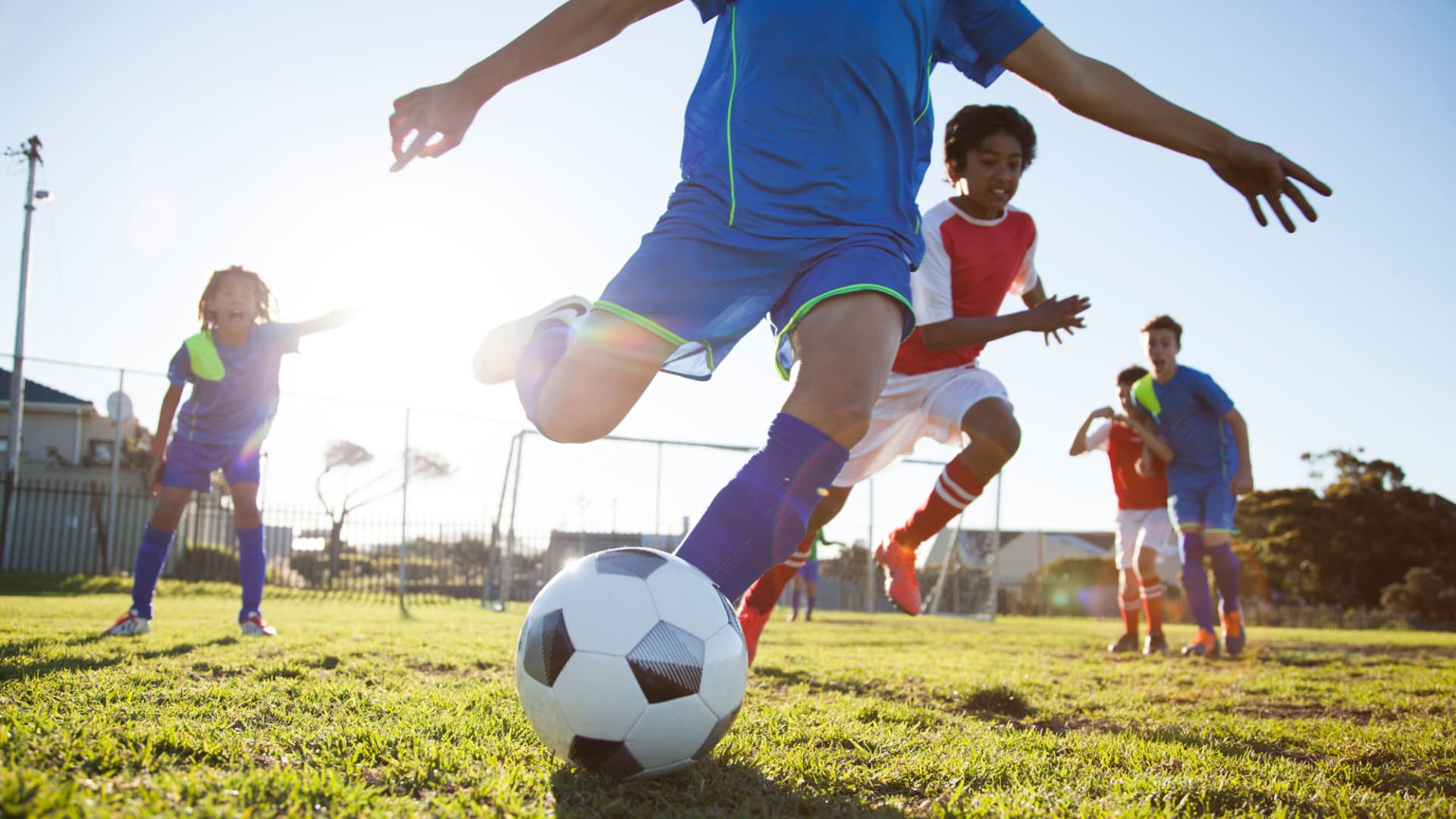 Kids playing football