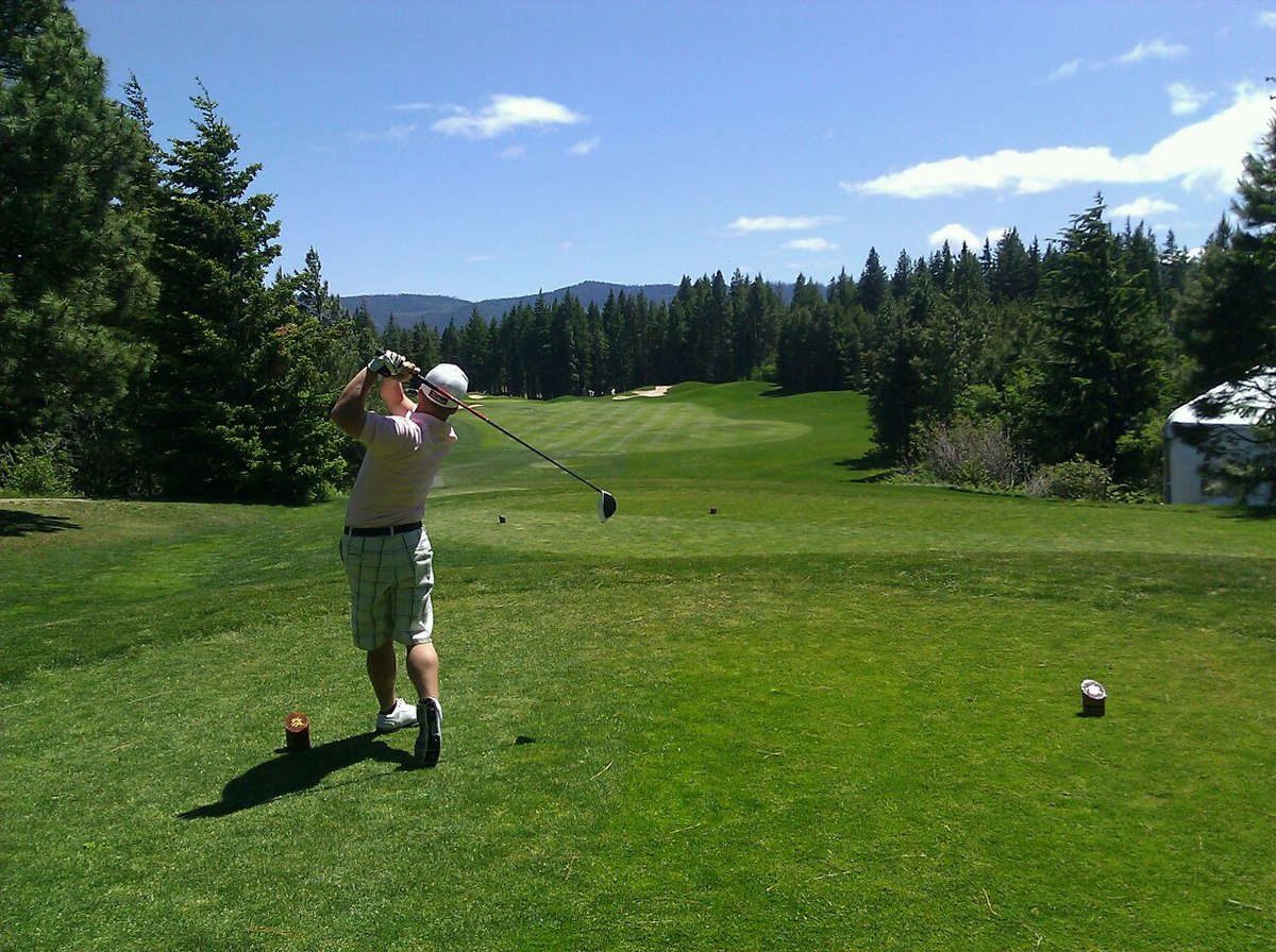 Man playing golf