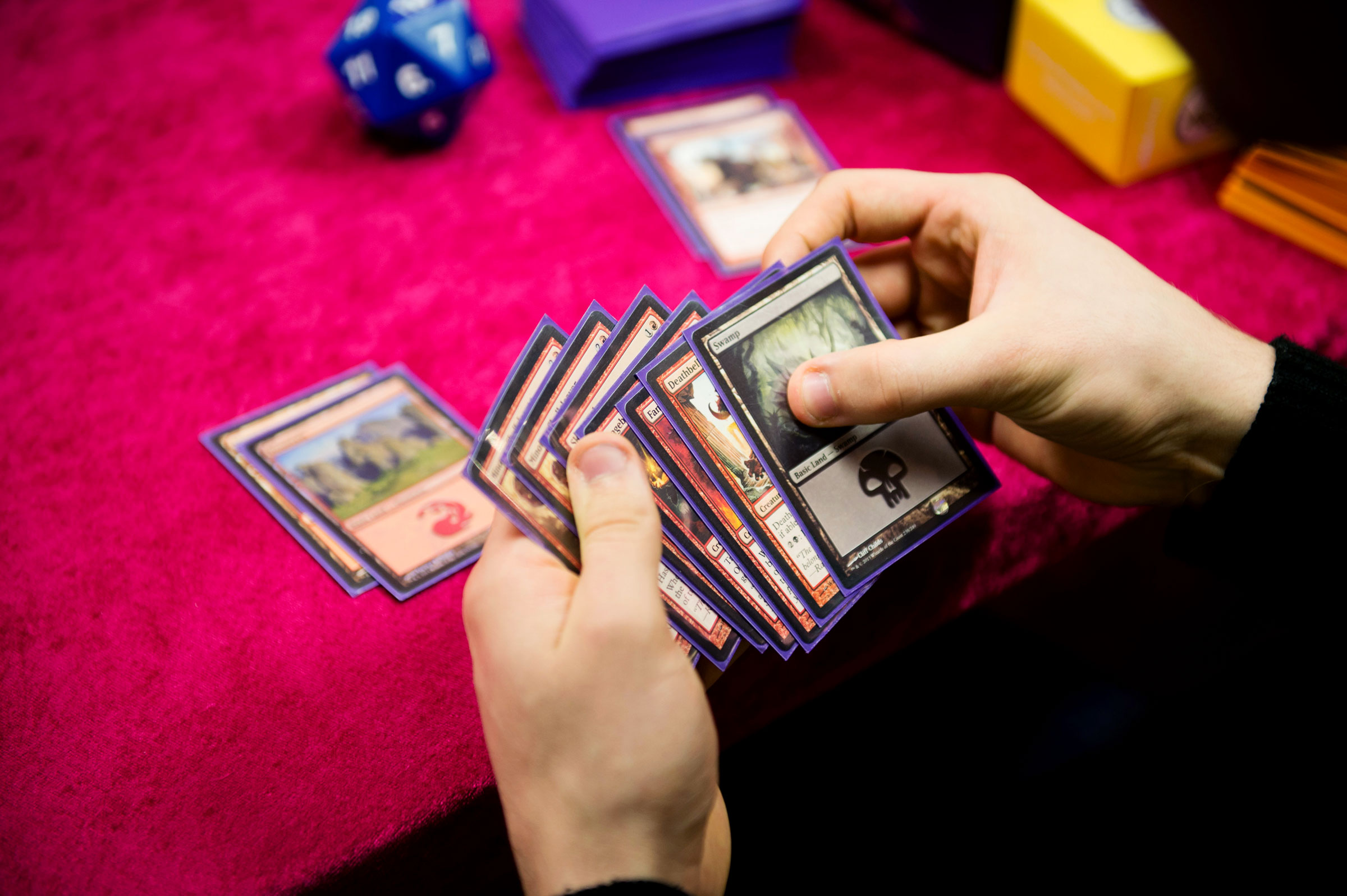 Man Playing Magic Cards