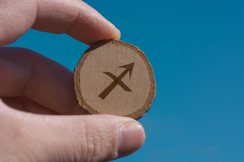 Zodiac Sign engraved on wood.