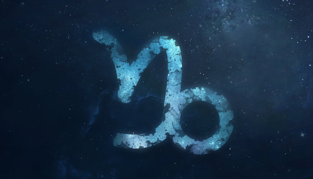 Capricorn zodiac sign in starry sky.