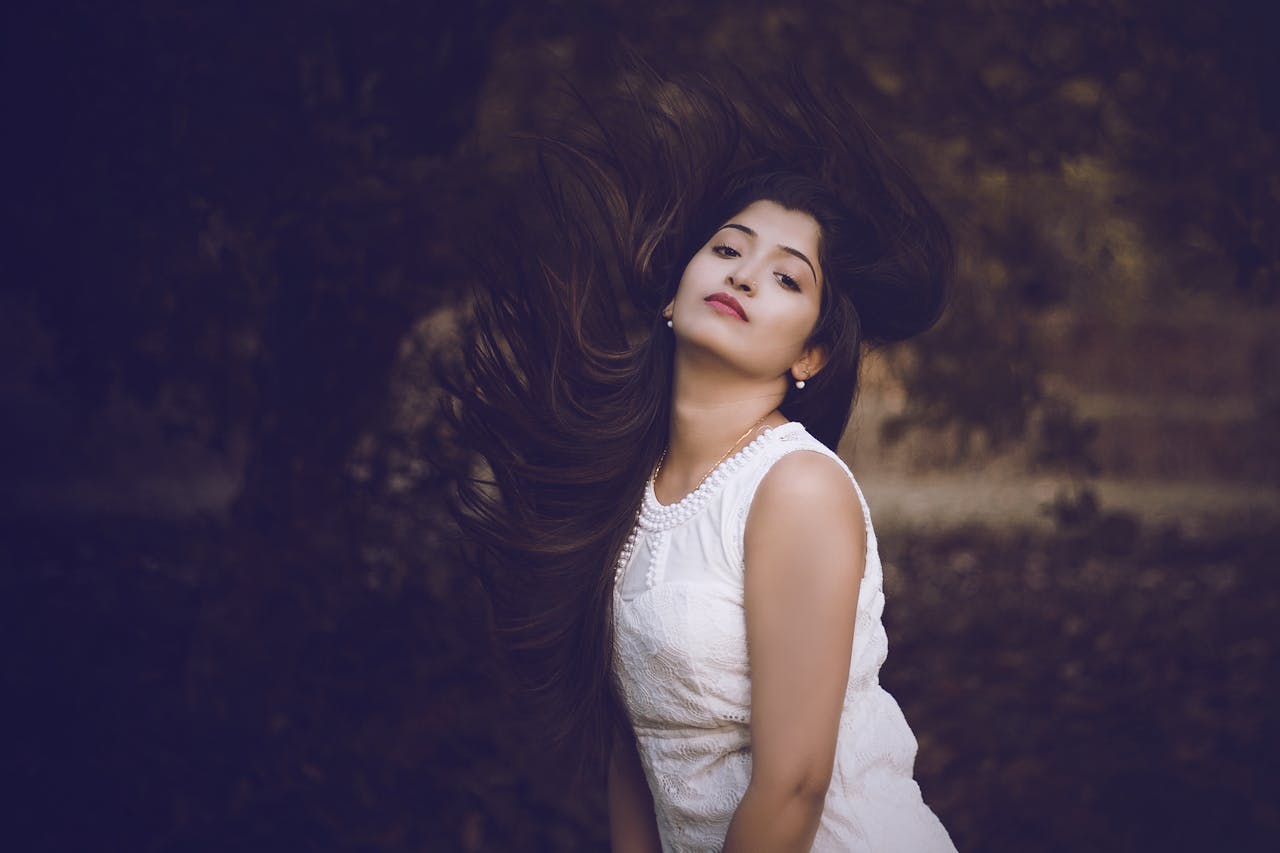 Woman in White Crew-neck Sleeveless Dress