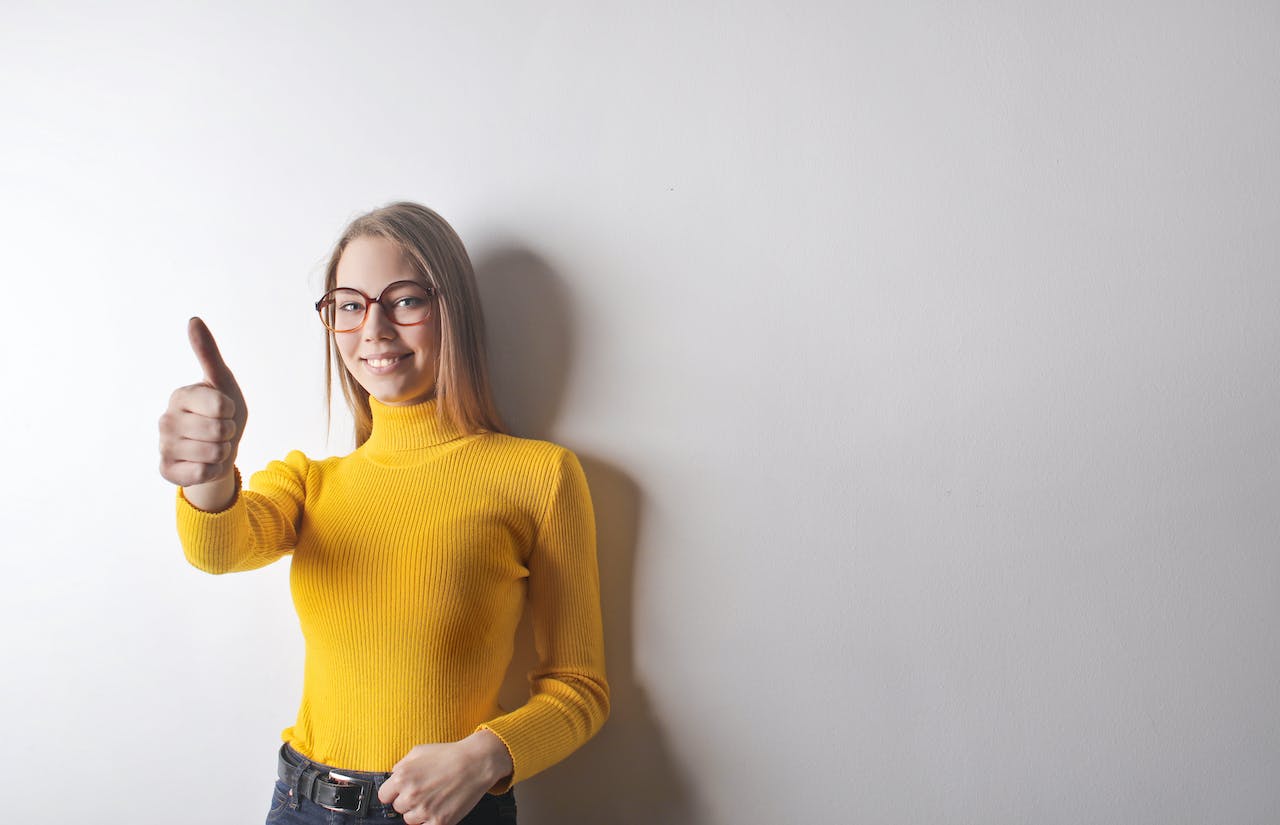 Woman in Yellow Turtleneck Sweater
